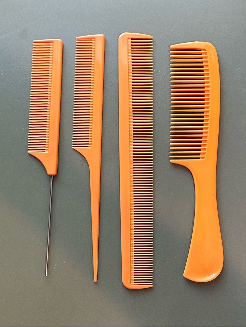 Vintage • brand new set of combs • unique orange color • really sturdy